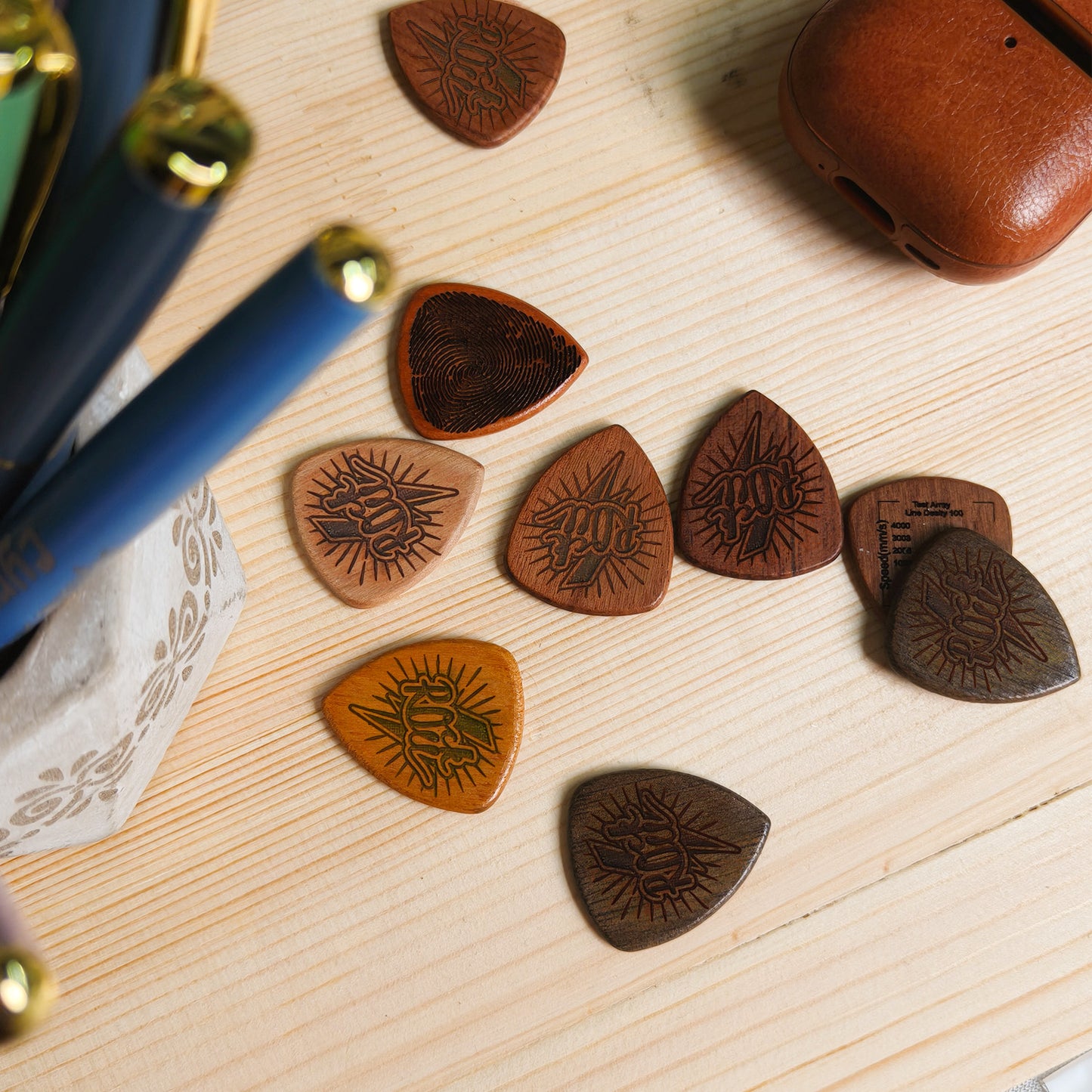 Rock guitar pick engraving