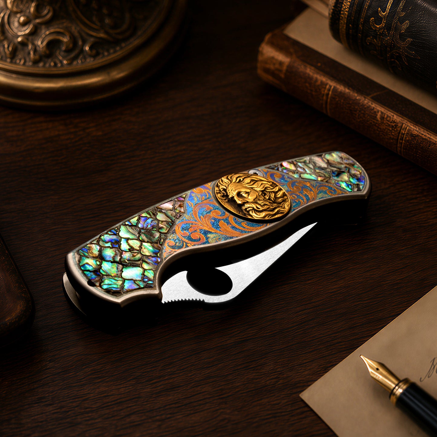 Titanium folding pocket knife with brass deep engraving, color engraving and mother-of-pearl inlay