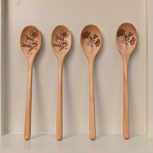 Wooden spoon with plant pattern engraving