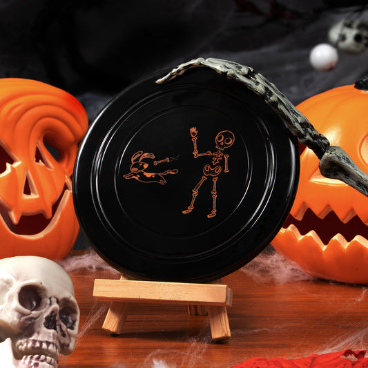 Halloween Skeleton Throwing a Bone Frisbee engraving